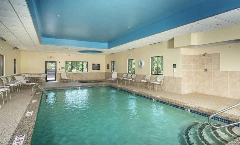 relaxing indoor pool with seating area at Hampton Inn Fall River/Westport.