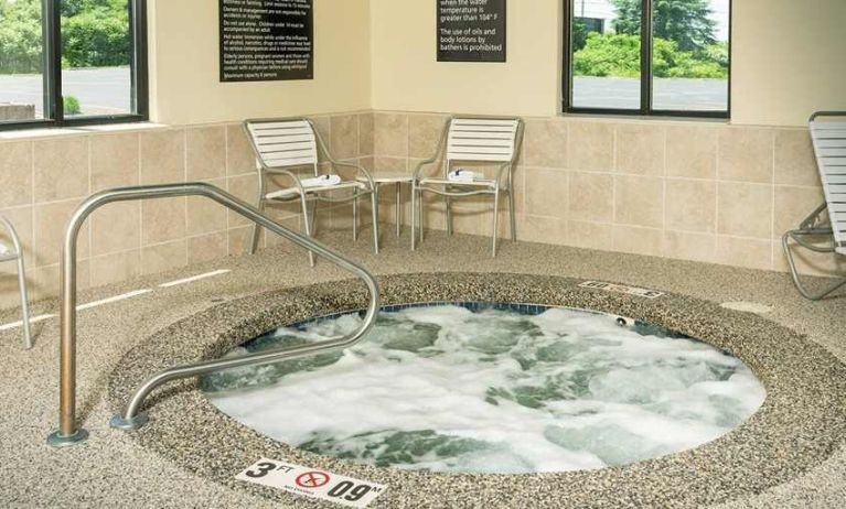 indoor hot tub with seating area at Hampton Inn Fall River/Westport.