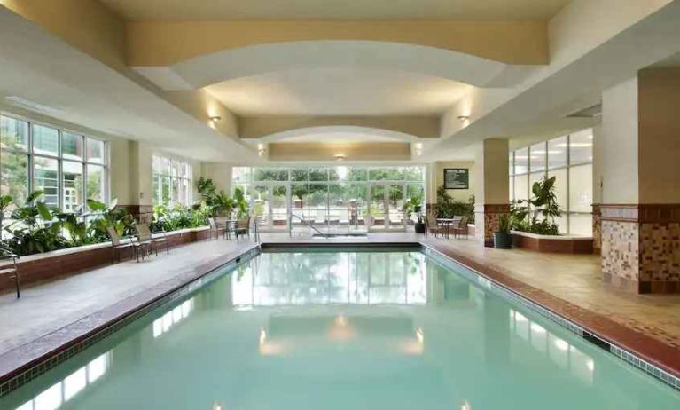 Relaxing indoor swimming pool at the Embassy Suites by Hilton Charleston Airport Convention Center.