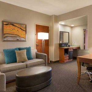 Spacious living room in a hotel suite at the Embassy Suites by Hilton Nashville - South-Cool Springs.