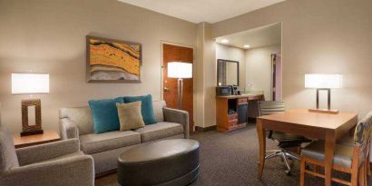 Spacious living room in a hotel suite at the Embassy Suites by Hilton Nashville - South-Cool Springs.