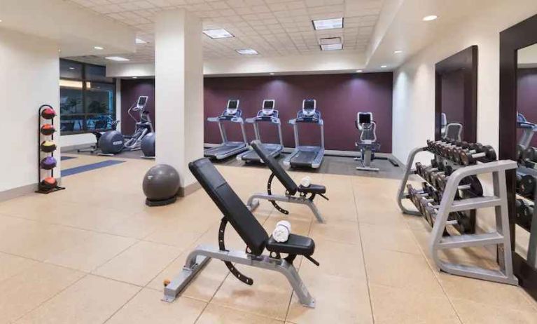 Weights and machines at the fitness center of the Embassy Suites by Hilton Nashville SE Murfreesboro.