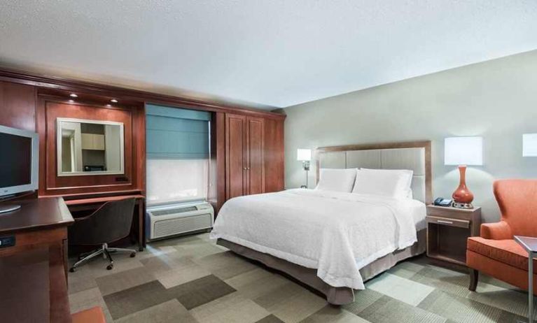 spacious king room with TV and work space at Hampton Inn Boston/Marlborough.