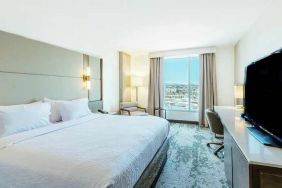 spacious king room with lots of natural light at Hilton Garden Inn Denver Union Station.