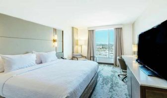 spacious king room with lots of natural light at Hilton Garden Inn Denver Union Station.