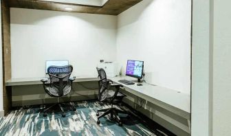 dedicated business center with PC, printer, and work desk ideal for working remotely at Hilton Garden Inn Denver Union Station.