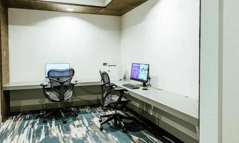 dedicated business center with PC, printer, and work desk ideal for working remotely at Hilton Garden Inn Denver Union Station.