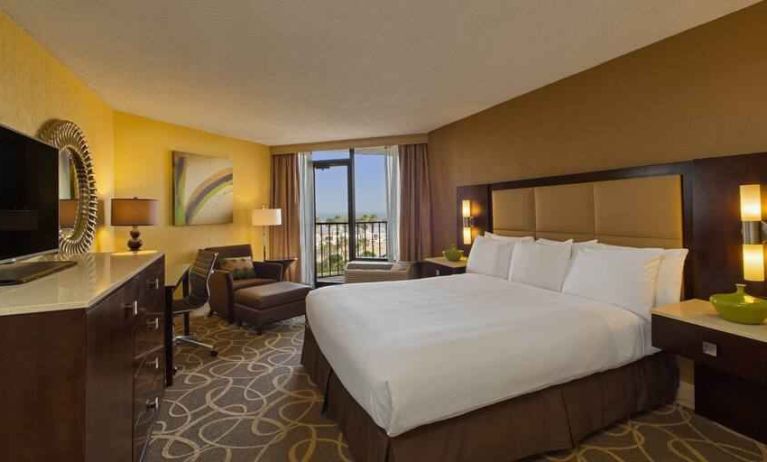 Beautiful deluxe king room with balcony and view at the Hilton Galveston Island Resort.