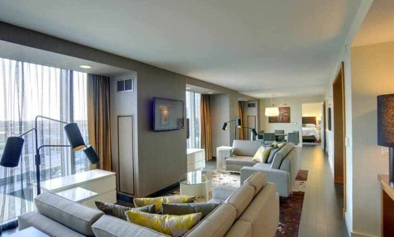 Spacious presidential living room with sofas and table at the Hilton Columbus Downtown.