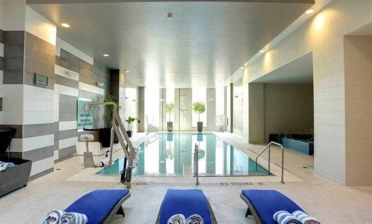 Relaxing indoor pool with lounges at the Hilton Columbus Downtown.