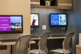 Working station with computers and printer at the Hilton Garden Inn Financial Center Manhattan Downtown, NY.