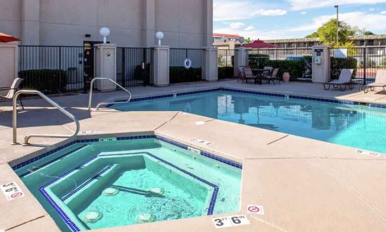 Beautiful outdoor area with two pools at the Hampton Inn Albuquerque, University-Midtown (UNM).