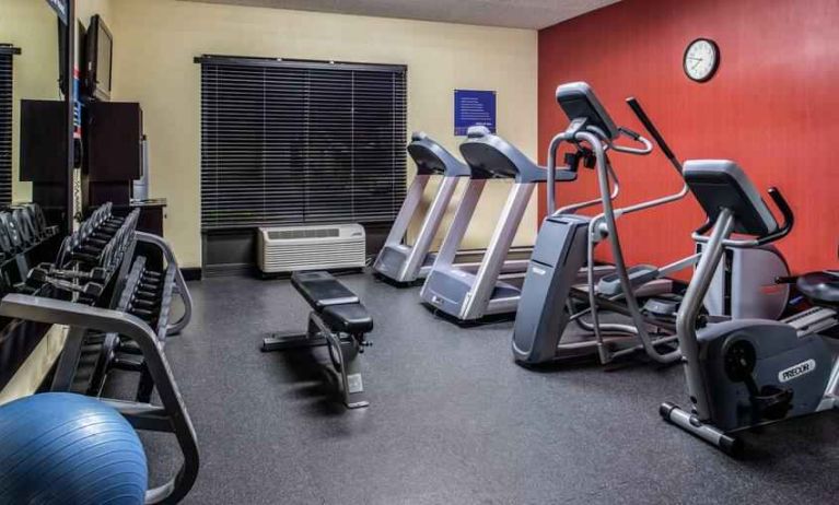 Fitness center with treadmills and machines at the Hampton Inn Albuquerque, University-Midtown (UNM).