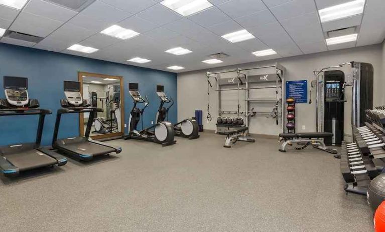 well-equipped fitness center at Hampton Inn Cape Cod Canal.