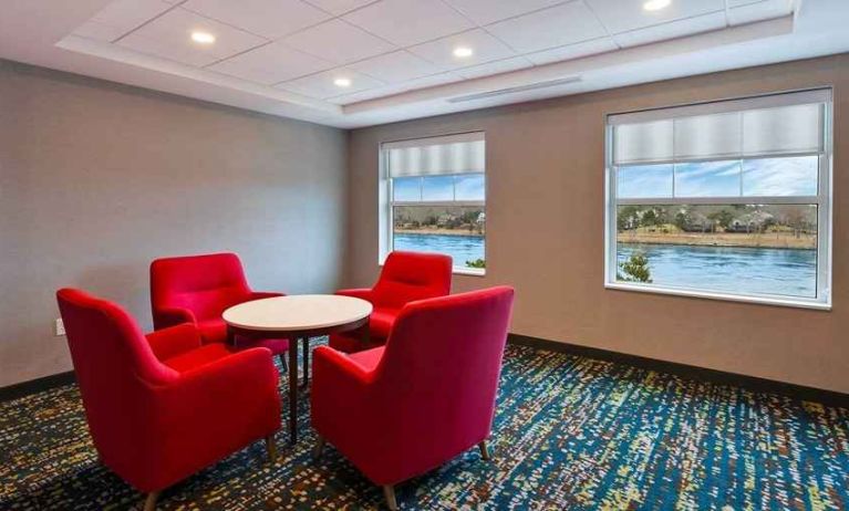 comfortable lobby and lounge area with beatuful view ideal for coworking at Hampton Inn Cape Cod Canal.