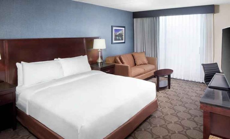 comfortable delux king room with TV and work desk ideal for working remotely at DoubleTree by Hilton Hotel Cleveland - Independence.