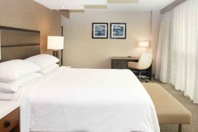 spacious delux king room with work desk and natural light ideal for working remotely at Embassy Suites by Hilton Seattle North Lynnwood.