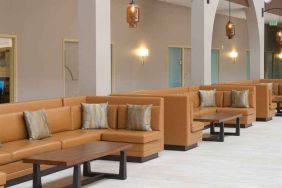 spacious lounge area ideal for coworking at Embassy Suites by Hilton Seattle North Lynnwood.