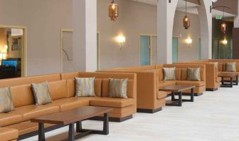 spacious lounge area ideal for coworking at Embassy Suites by Hilton Seattle North Lynnwood.