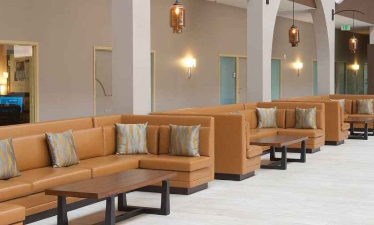 spacious lounge area ideal for coworking at Embassy Suites by Hilton Seattle North Lynnwood.