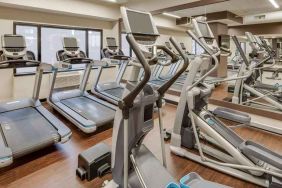 fully equipped fitness center at DoubleTree by Hilton Hotel & Suites Jersey City.