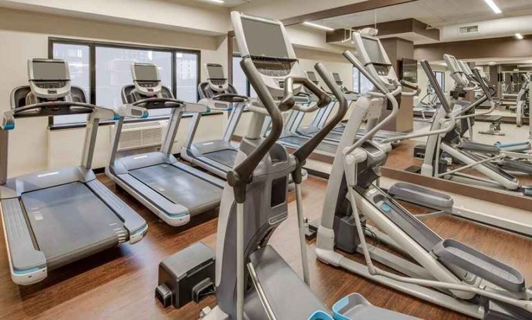 fully equipped fitness center at DoubleTree by Hilton Hotel & Suites Jersey City.