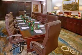 Elegant meeting room with comfortable chairs at the DoubleTree by Hilton Tulsa-Downtown.