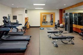 Fully equipped fitness center at the DoubleTree by Hilton Tulsa-Downtown.