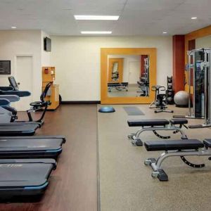 Fully equipped fitness center at the DoubleTree by Hilton Tulsa-Downtown.