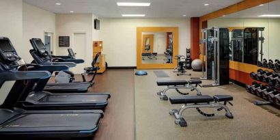 Fully equipped fitness center at the DoubleTree by Hilton Tulsa-Downtown.