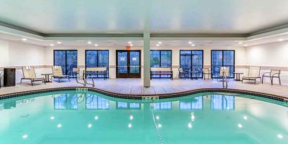 Indoor pool with lounges at the Hampton Inn Boston-Peabody.