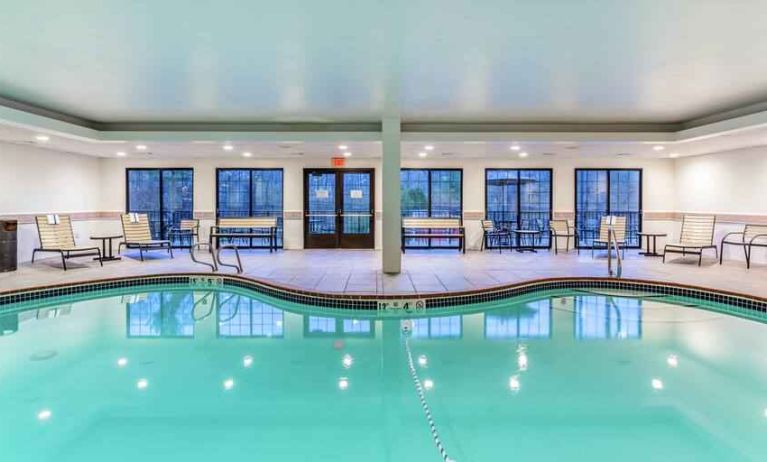 Indoor pool with lounges at the Hampton Inn Boston-Peabody.