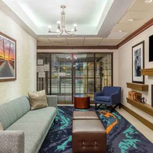 Comfortable and stylish lobby workspace at the Hampton Inn Boston-Peabody.