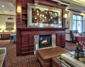 Lobby workspace by the fireplace at the Hilton Garden Inn Albuquerque Uptown.