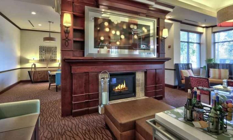 Lobby workspace by the fireplace at the Hilton Garden Inn Albuquerque Uptown.