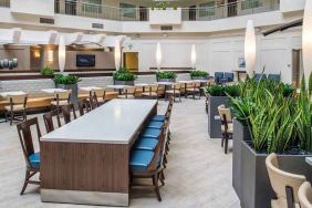 comfortable lobby lounge area ideal as a coworking space at Embassy Suites by Hilton Seattle Tacoma International Airport.