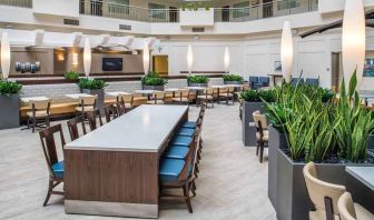 comfortable lobby lounge area ideal as a coworking space at Embassy Suites by Hilton Seattle Tacoma International Airport.