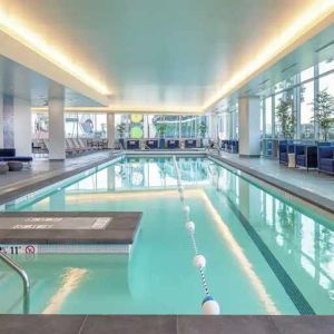 large indoor pool ideal for doing laps at Embassy Suites by Hilton Seattle Downtown Pioneer Square.