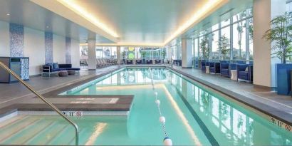 large indoor pool ideal for doing laps at Embassy Suites by Hilton Seattle Downtown Pioneer Square.