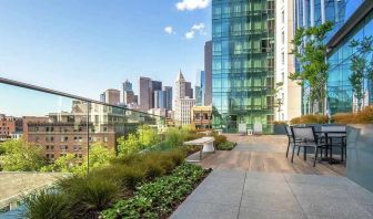 lovely outdoor patio with city scape views at Embassy Suites by Hilton Seattle Downtown Pioneer Square.