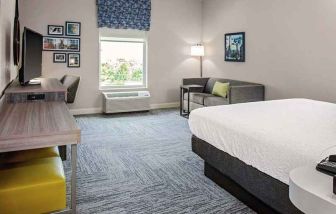 spacious delux king room with TV, work desk and lots of natural light at Hampton Inn Cranbury.