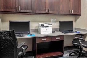 dedicated business center with printers, internet, and work desks at Hampton Inn Cranbury.