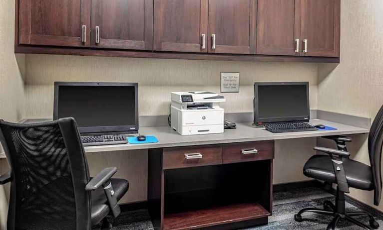 dedicated business center with printers, internet, and work desks at Hampton Inn Cranbury.