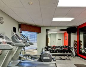 Weights and treadmills at the fitness center of the Homewood Suites by Hilton Bel Air.