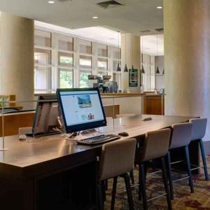 Workstation in a hotel lobby at the DoubleTree by Hilton Tulsa - Warren Place.