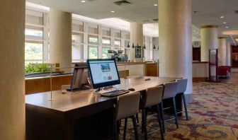 Workstation in a hotel lobby at the DoubleTree by Hilton Tulsa - Warren Place.