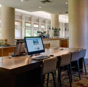 Workstation in a hotel lobby at the DoubleTree by Hilton Tulsa - Warren Place.