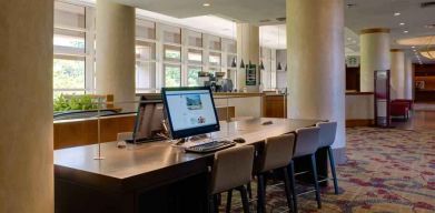 Workstation in a hotel lobby at the DoubleTree by Hilton Tulsa - Warren Place.