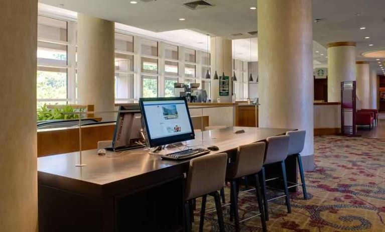 Workstation in a hotel lobby at the DoubleTree by Hilton Tulsa - Warren Place.