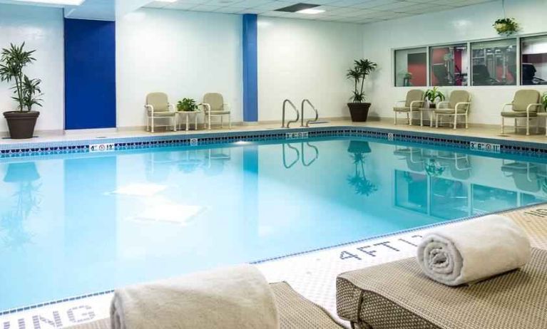 Relaxing indoor pool with lounges at the Hilton Chicago-Northbrook.